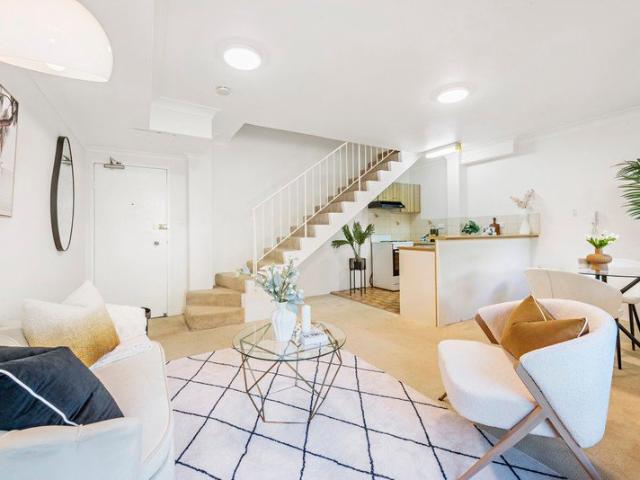 Comfortable Top Floor Split Level with Secure Parking in Prime Inner City Location