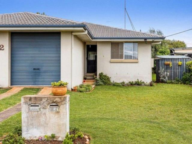 Comfortable Two Bedroom Unit with Fenced Backyard