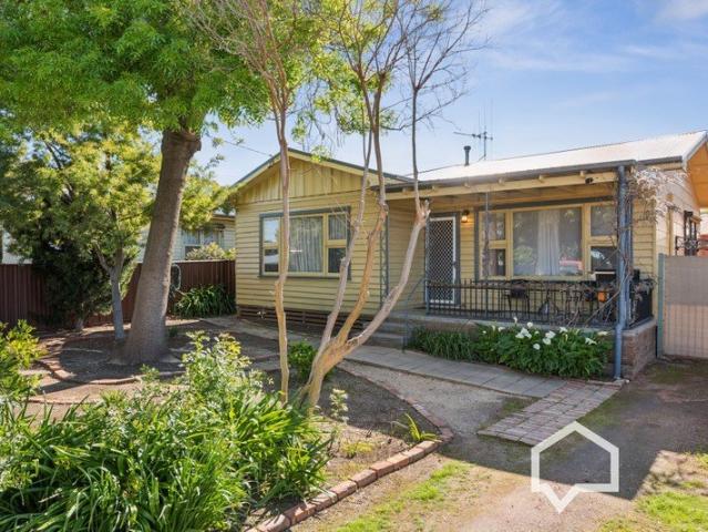 Comfortable Two Bedroom Home with Spacious Shed