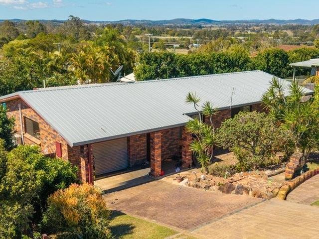 COMFORTABLE BRICK HOME WITH SPACE, CONVENIENCE & POTENTIAL