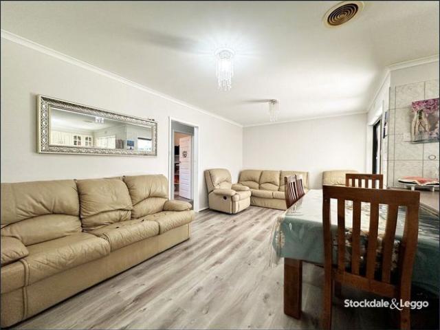 COMFORTABLE & CONVENIENT THREE BEDROOM HOME