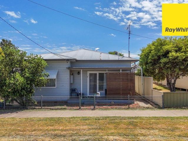 Comfortable Country Living or Solid Investment The Choice is Yours