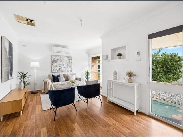 Comfortable Family Home with Expansive Backyard