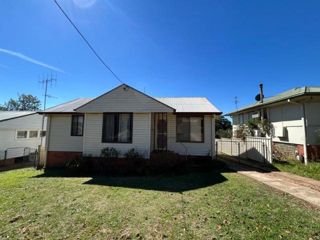 Comfortable Family Home with Spacious Backyard
