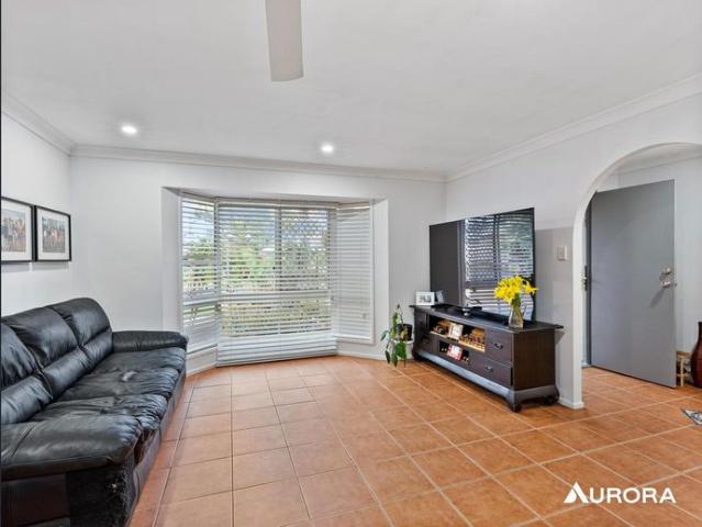 Comfortable family home offering space, functionality, and the chance to make it your own!