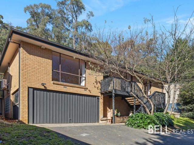Comfortable Family Living on Half an Acre with Walk to Town Convenience