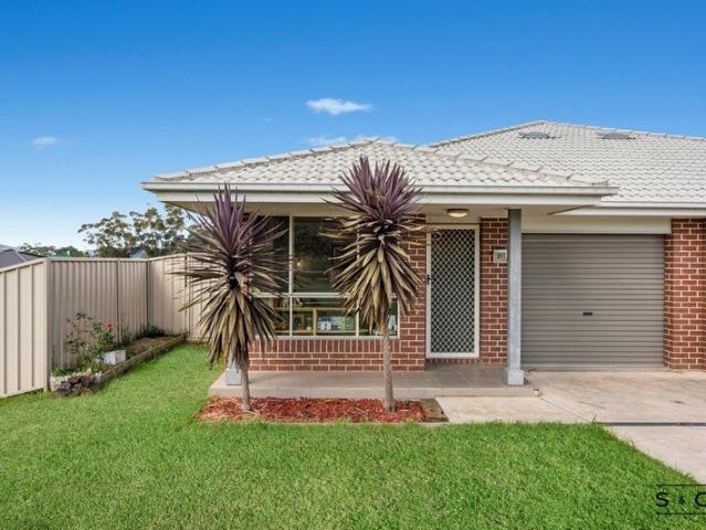 COMFORTABLE FAMILY LIVING CLOSE TO TOWN