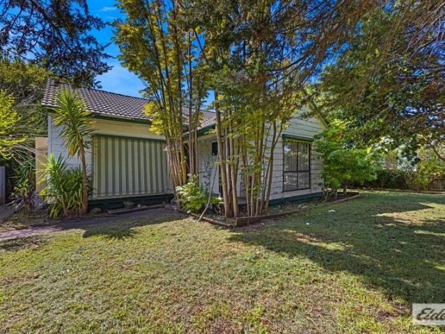 Comfortable Family Living in a Convenient Corner Location