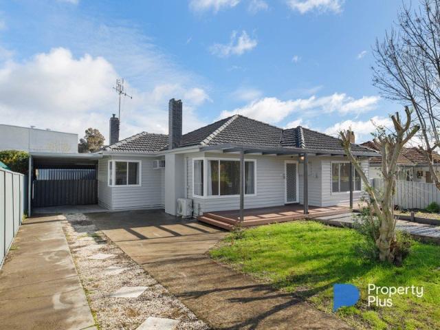 Comfortable Family Living with a Backyard to Enjoy