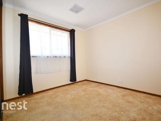 Comfortable Family Living with Bonus Sunroom!