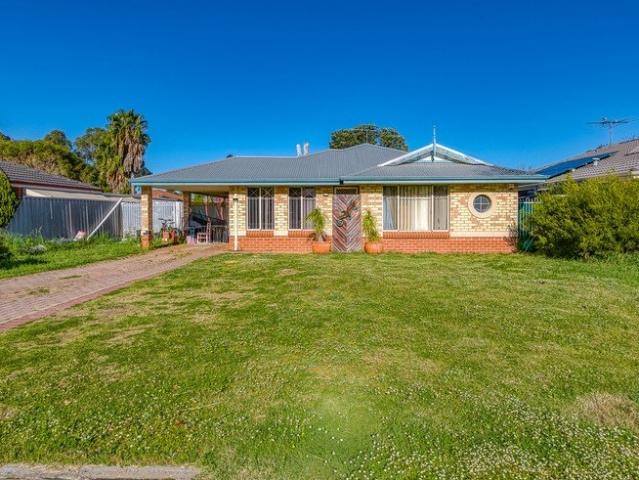 Comfortable Family Living with Space and Potential!