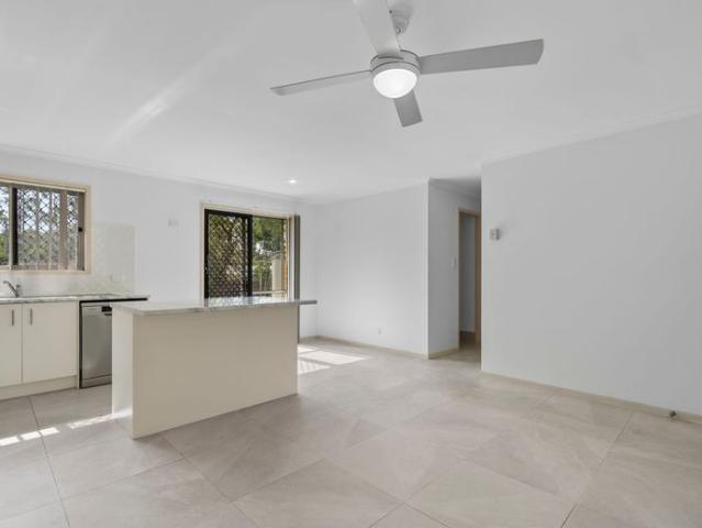 Comfortable Family Living with Updated Kitchen & Spacious Yard