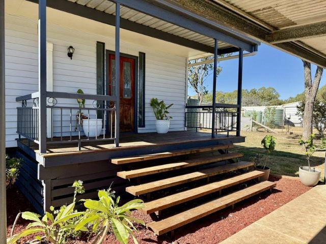 Comfortable home with a great shed on large block