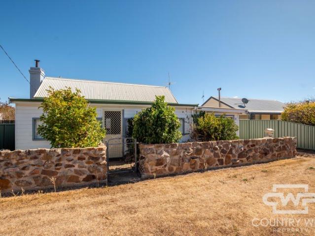 Comfortable Home with Exceptional Shed Space