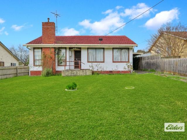 Comfortable Home with Flexible Living Space & Large Backyard
