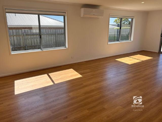 COMFORTABLE LIVING LANDSCAPED AND SIDE ACCESS