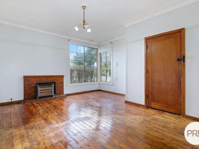 COMFORTABLE LIVING WITH SECURE YARD!