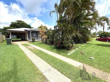 Comfortable Low Maintenance 3 Bedroom Home with Spacious Yard & Multiple Living Areas