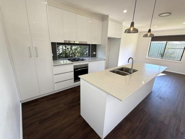 COMFORTABLE & LOW MAINTENANCE HOME