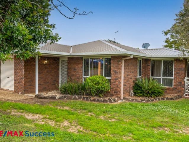 Comfortable Newtown Home with Multiple Living Spaces
