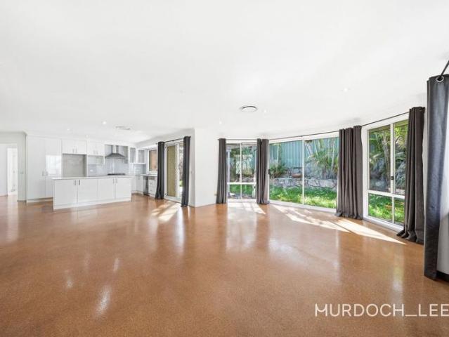 Comfortable Single Level Family Living in a Prime Location