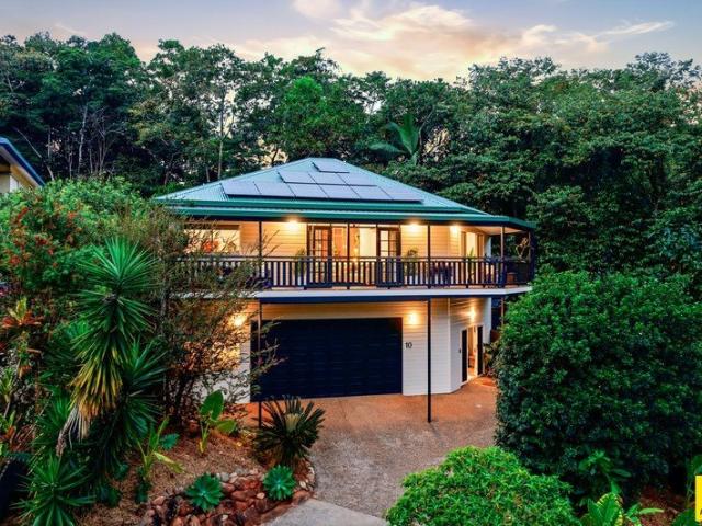 A lovingly renovated highset home where the trees are your backdrop