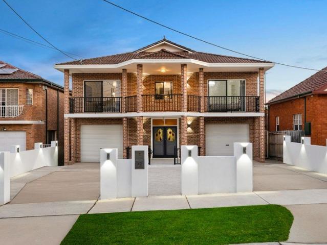 Commanding Four Bedroom Family Haven with Multiple Living Zones and Dual Garages on 645SQM Parcel