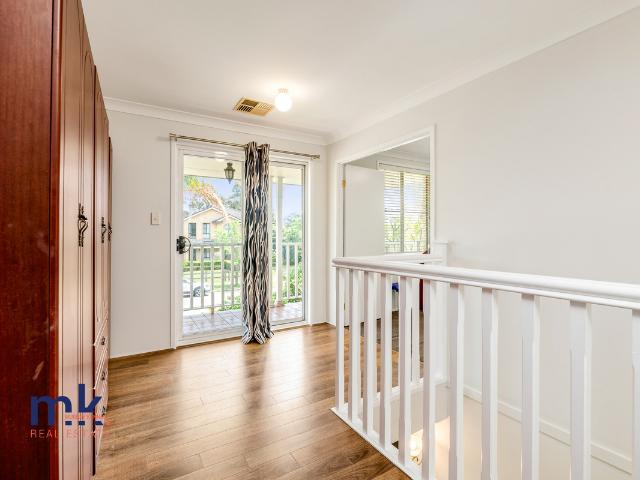 Commanding two storey home with great yard and two street access!