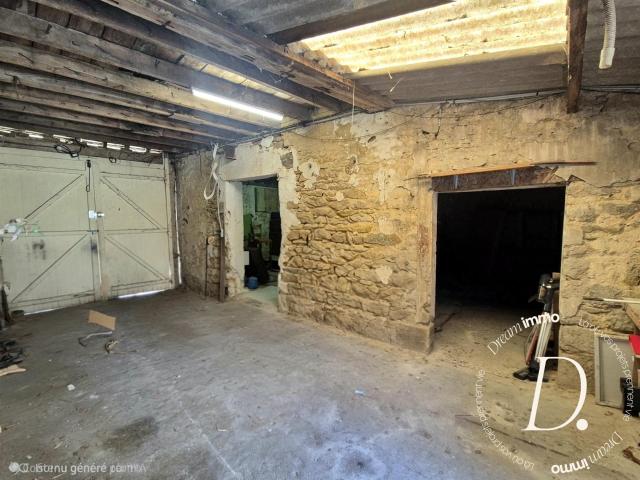 Commerce, habitation, grange et terrain constructible potent. 92m² Gasny