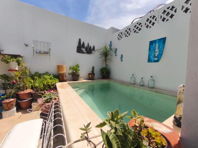 COMODA CASA EN VENTA SOLA PLANTA CON ALBERCA MERIDA CENTRO AVC 2806