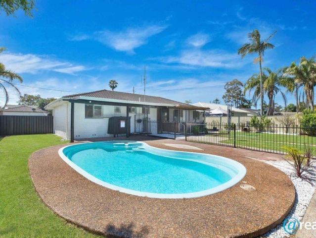 Completely Renovated Coastal Entertainer with Inground Pool and Spa