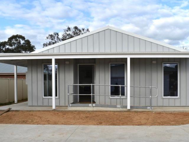 Contemporary 2 Bedroom Unit with Solar Panels & Accessible Design