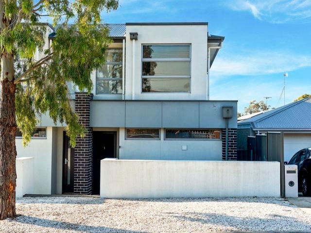 Contemporary 2 Story Townhouse in Peaceful Lifestyle Location!