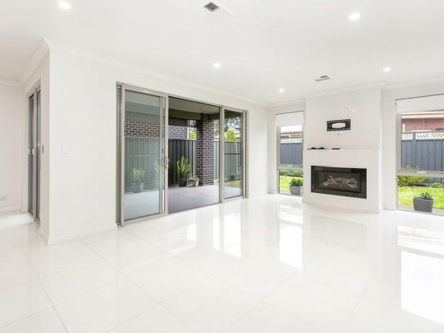 Contemporary Courtyard Living with Space, Style & Superb Convenience