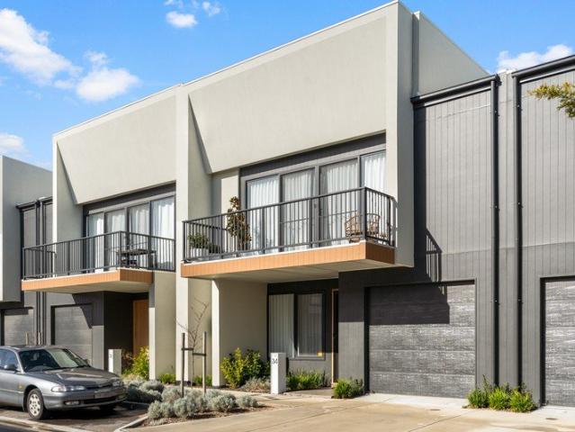 Contemporary Coastal Townhouse with Designer Finishes