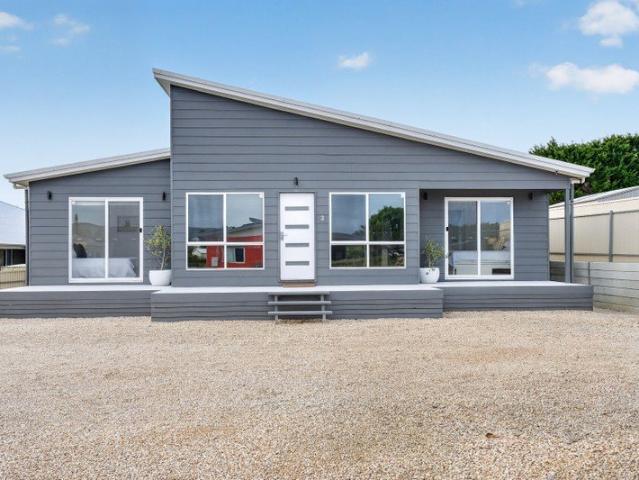 Contemporary Coastal Living on a Generous Dual Access Allotment