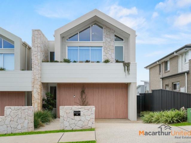 !Contemporary Coastal Luxury with Elevated Design & Effortless Living!