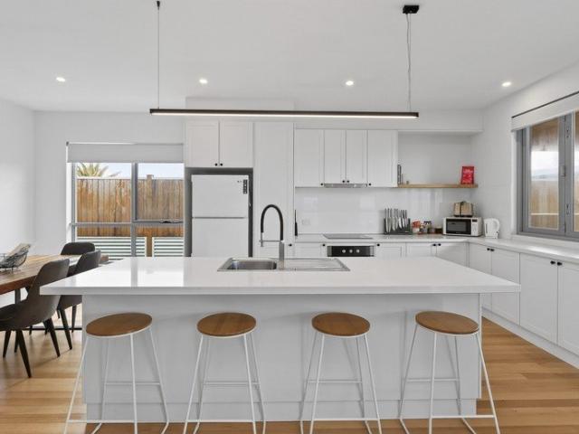 Contemporary coastal sophistication perfectly positioned