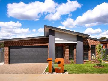 Contemporary comfort with low maintenance outdoor living & side access