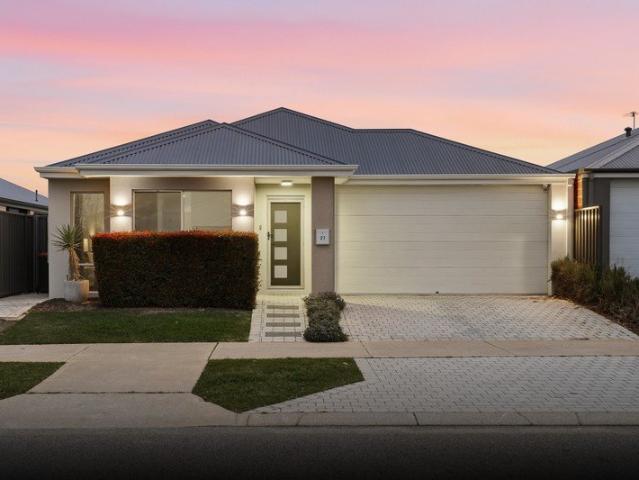 CONTEMPORARY COMFORT IN THIS PERFECTLY PLACED AND EASY CARE FAMILY HOME