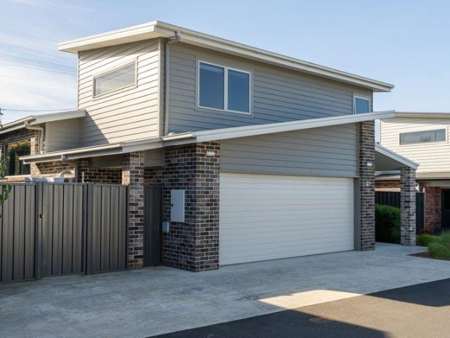 CONTEMPORARY COMFORT IN A SECURE COMMUNITY