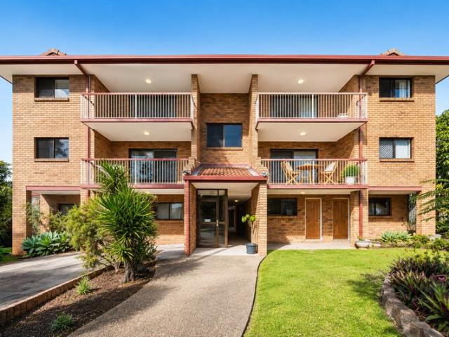 Contemporary Comfort in a Tightly Held Clayfield Address