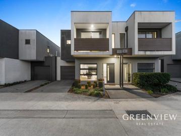 Contemporary Comfort & Low Maintenance Living in a Prime Location