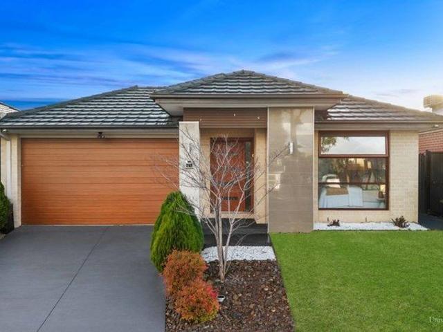 Contemporary Comfort Meets Family Functionality in a Prime Location !