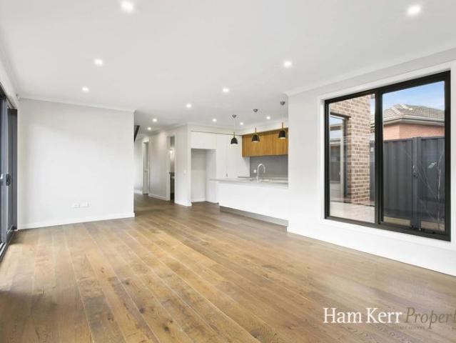 Contemporary Charm in a Prized School Zone Location