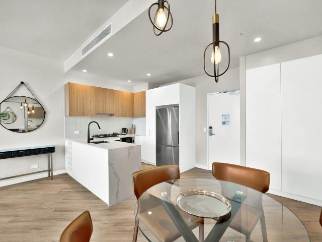 Contemporary and Secure Apartment with Balcony and City Convenience