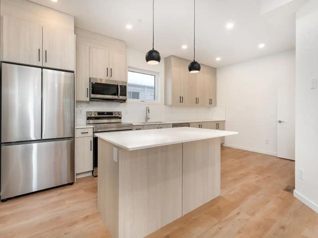 Contemporary and unique 2 bedroom Main Floor Downtown