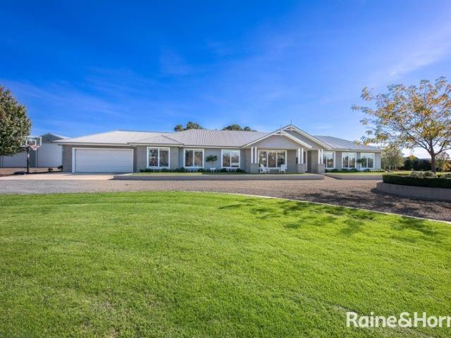 Contemporary Acreage Living with Premium Features & Space to Match