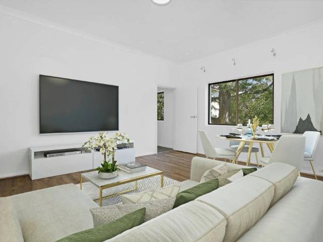 Contemporary Art Deco Apartment in one of Bondi Beach's most sought after locations with Single Lock Up Garage