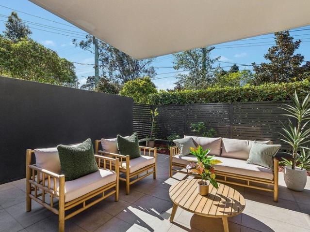 Contemporary garden oasis impresses with an easy care house like feel